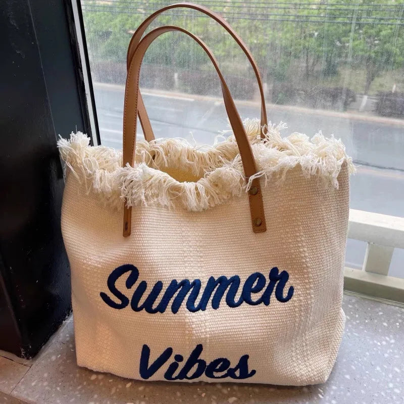 Large Capacity Canvas Beach Bag Tassel Design Summer Letter Tote Bag for Women Outdoor Travel Picnic Commuter Daily Use